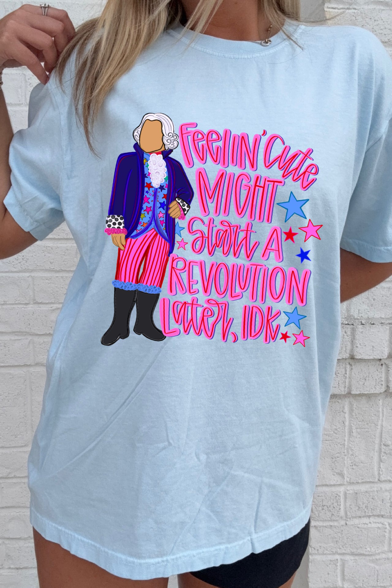 Feelin' Cute, Might Start a Revolution Tees